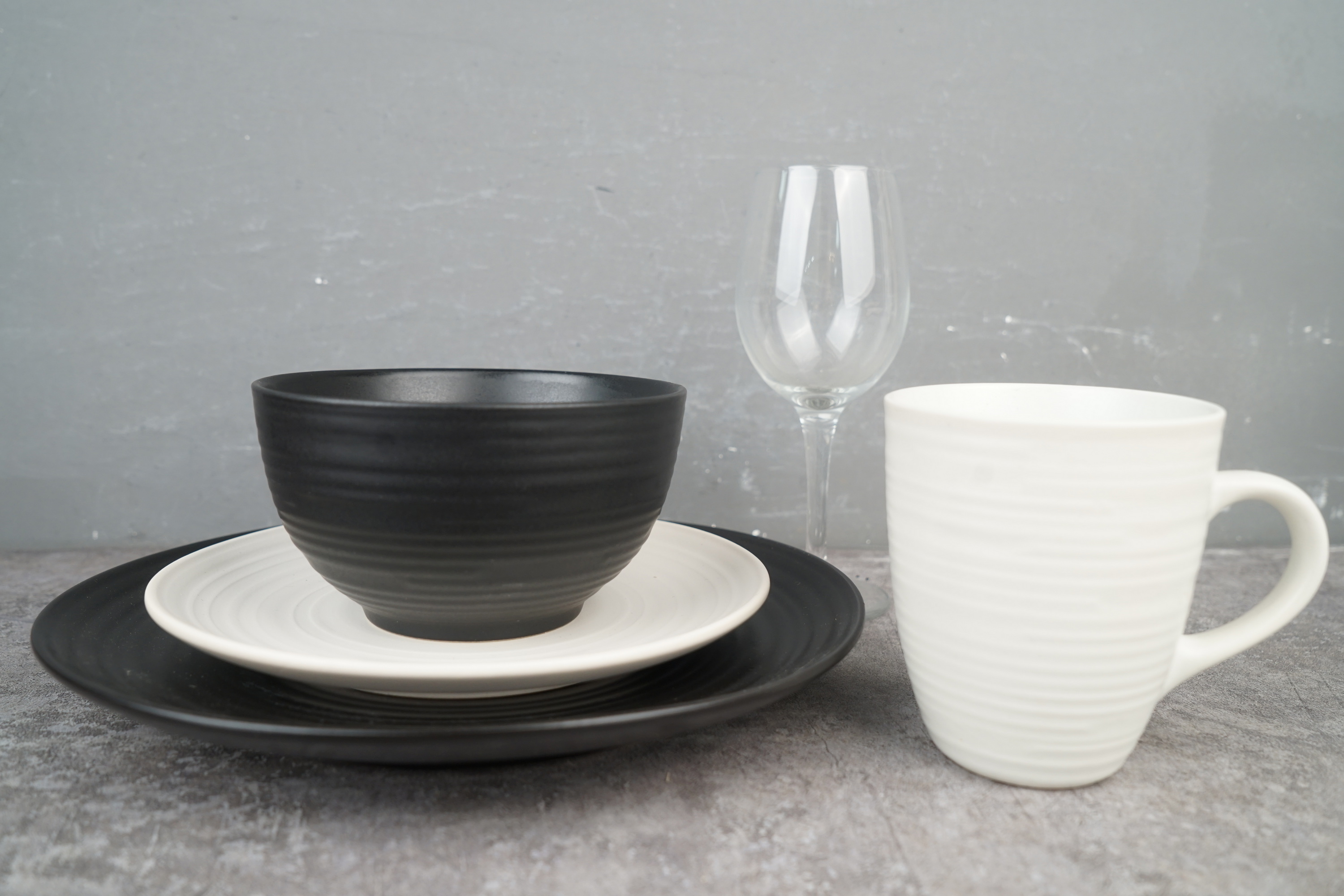 Stoneware Embossed Lines Classic Black and White Dinnerware Set